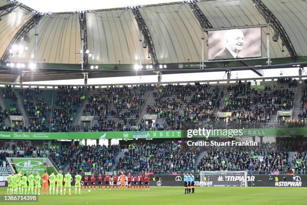 Players, officials and fans take part in a minutes silence in remembrance of Egidius Braun, Honorary President of the German Football Association...