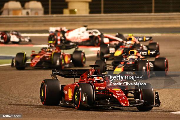 Charles Leclerc of Monaco driving the Ferrari F1-75 leads the field at the restart following a safety car period during the F1 Grand Prix of Bahrain...