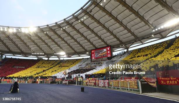 General view inside the stadium as fans create a mural prior to the Serie A match between AS Roma and SS Lazio at Stadio Olimpico on March 20, 2022...