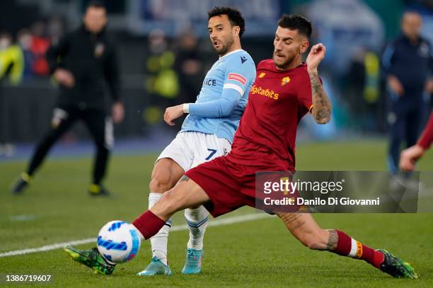 Felipe Anderson of S.S. Lazio compete for the ball with Lorenzo Pellegrini of A.S. Roma during the Serie A match between AS Roma and SS Lazio at...