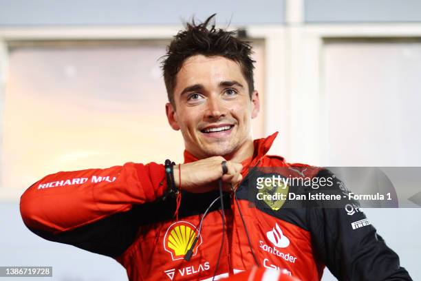 Race winner Charles Leclerc of Monaco and Ferrari smiles in parc ferme during the F1 Grand Prix of Bahrain at Bahrain International Circuit on March...