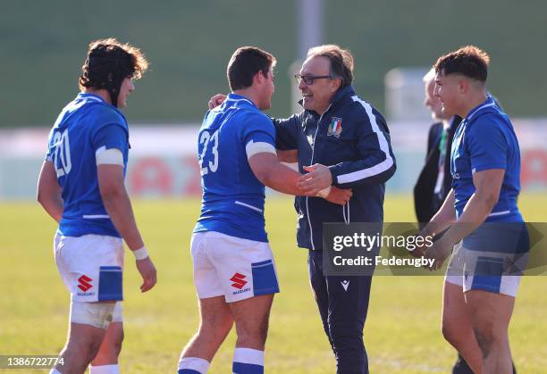 Massimo Brunello the Head Coach of Italy U20 celebrates with his players after the U20 Six Nations Rugby match between Wales and Italy at Eirias...