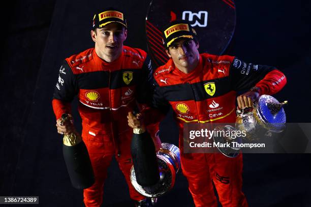 Race winner Charles Leclerc of Monaco and Ferrari and Second placed Carlos Sainz of Spain and Ferrari celebrate on the podium during the F1 Grand...