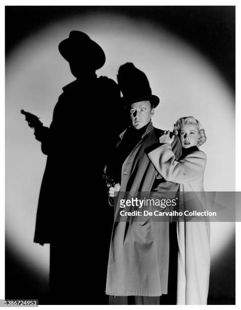 Actor Van Johnson as 'Mike Conovan' and Actress Gloria DeHaven as 'Lili' in a publicity shot from the film noir 'Scene of the Crime' United States.