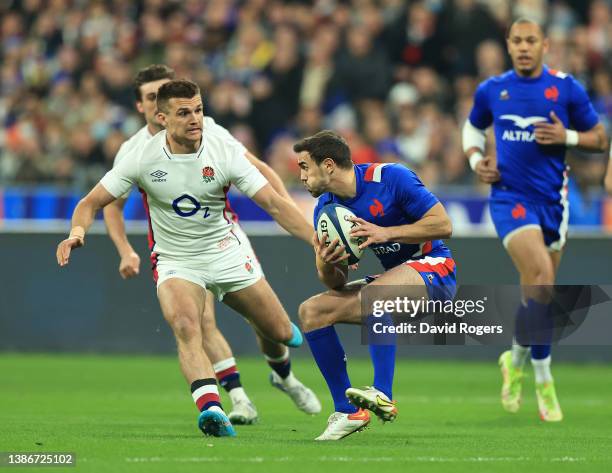 Melvyn Jaminet of France takes on Henry Slade during the Guinness Six Nations Rugby match between France and England at the Stade de France on March...