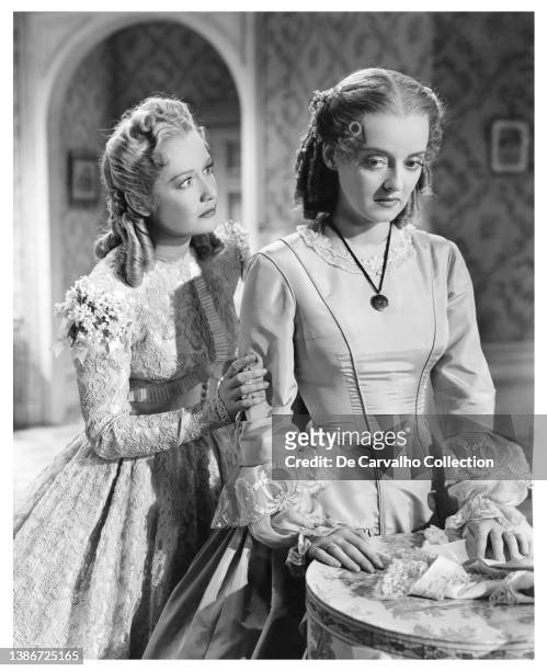 Actress Miriam Hopkins as 'Delia Lovell Ralston' and Actress Bette Davis as 'Charlotte Lovell' in a scene from the movie 'The Old Maid' United States.