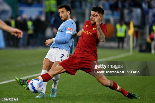 Felipe Anderson of SS Lazio compete for the ball with Lorenzo Pellegrini of AS Roma during the Serie A match between AS Roma and SS Lazio at Stadio...