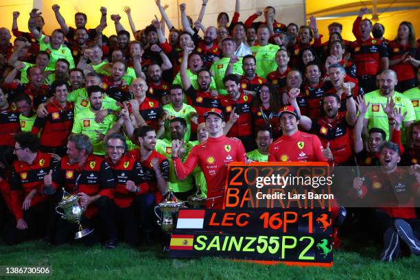 Race winner Charles Leclerc of Monaco and Ferrari and Second placed Carlos Sainz of Spain and Ferrari celebrate with their team after the F1 Grand...