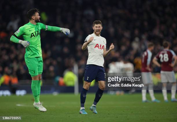 Hugo Lloris and Ben Davies celebrate after Heung-Min Son of Tottenham Hotspur scored their sides third goal during the Premier League match between...