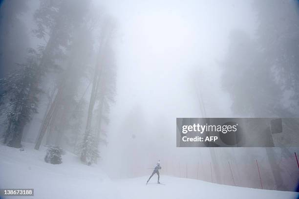 Biathlete skis during a test competition of the Russian Cup in the “Laura” complex, one of n the Sochi 2014 Olympics venues, in Krasnaya Polyana, on...