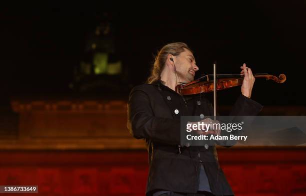 David Garrett performs at the musical peace rally Sound of Peace at the Brandenburg Gate on March 20, 2022 in Berlin, Germany. The televised event...