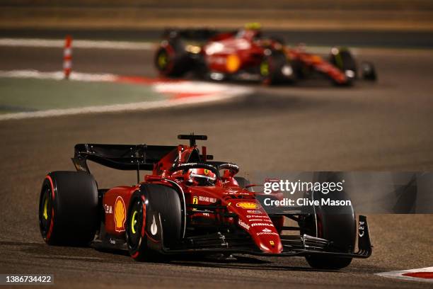 Charles Leclerc of Monaco driving the Ferrari F1-75 leads Carlos Sainz of Spain driving the Ferrari F1-75 during the F1 Grand Prix of Bahrain at...