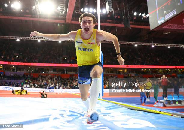 Armand Duplantis of Sweden celebrates after setting a new World Record during the Men's Pole Vault Final during Day Three of the World Athletics...