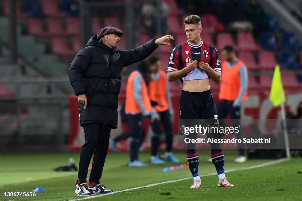 Sinisa Mihajlovic head coach of Bologna FC issues instructions to Mattias Svanberg of Bologna FC during the Serie A match between Bologna FC and...