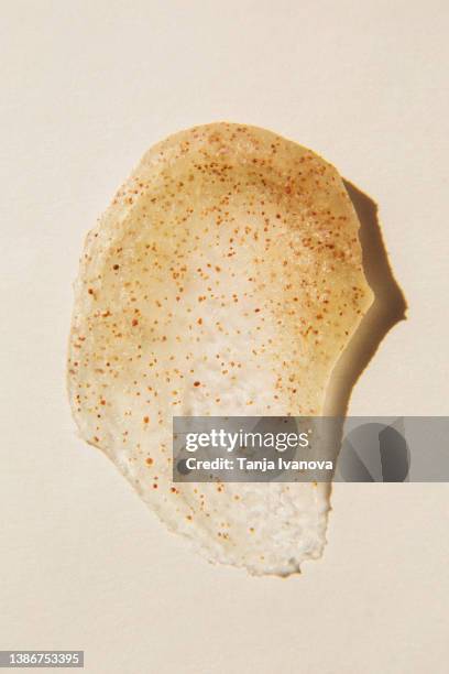 texture mask scrub for face and body on beige background - exfoliation stock pictures, royalty-free photos & images