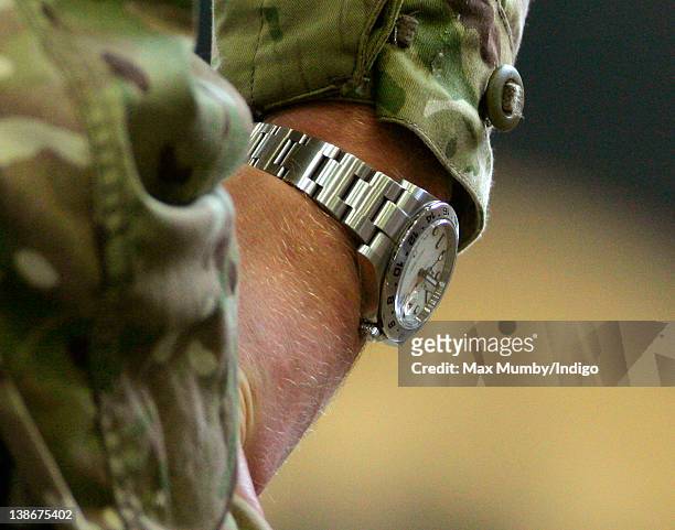 Prince Harry's Rolex Explorer II watch seen as he visits RAF Honington to meet Service personnel and their families on February 10, 2012 in Suffolk,...