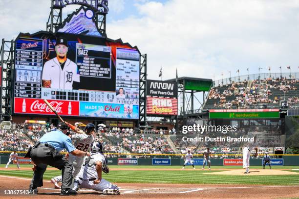 Javier Baez of the Detroit Tigers hits a first-inning grand slam homerun off of Connor Seabold of the Colorado Rockies in the first-inning of a game...