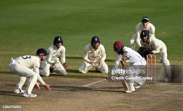 West Indies captain Kraigg Brathwaite bats surrounded by close England fielders during day five of the 2nd test match between West Indies and England...