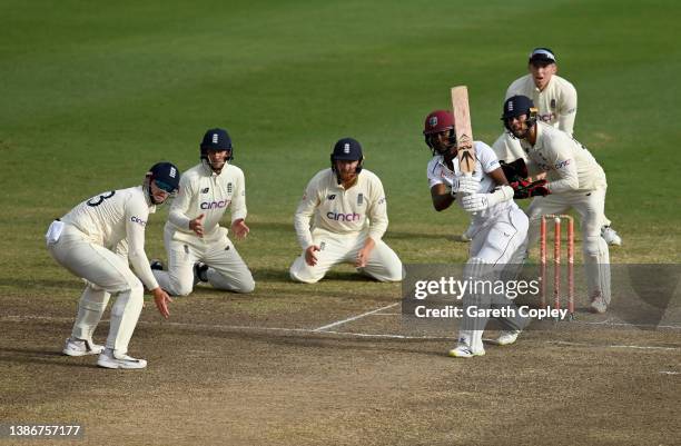 West Indies captain Kraigg Brathwaite bats surrounded by close England fielders during day five of the 2nd test match between West Indies and England...