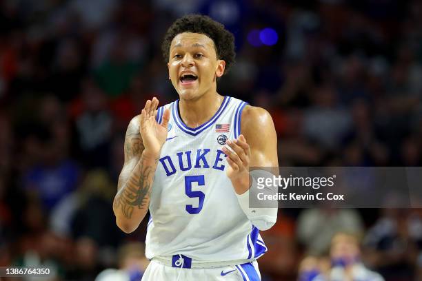 Paolo Banchero of the Duke Blue Devils reacts after a three point basket in the first half against the Michigan State Spartans during the second...