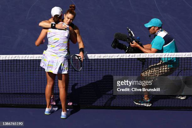 Iga Swiatek of Poland shakes hands at the net after her straight sets victory against Maria Sakkari of Greece in the women's Final on Day 14 of the...