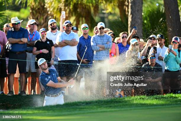 Sam Burns of the United States plays a shot from a bunker on the 17th hole during the final round of the Valspar Championship on the Copperhead...