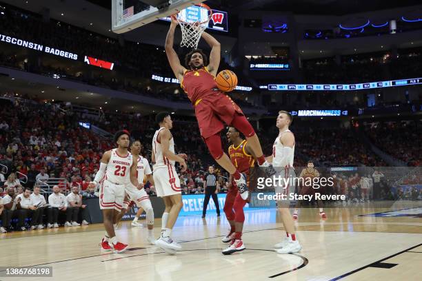 George Conditt IV of the Iowa State Cyclones dunks the ball in front of Johnny Davis of the Wisconsin Badgers during the first half in the second...