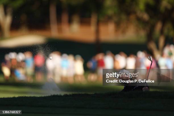 Davis Riley of the United States plays a shot from a bunker on the 18th hole during a playoff during the final round of the Valspar Championship on...