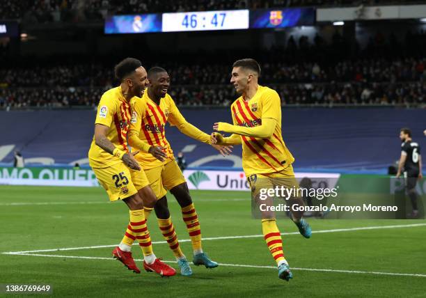 Ferran Torres of Barcelona celebrates with Pierre-Emerick Aubameyang and Ousmane Dembele after scoring their team's third goal during the LaLiga...