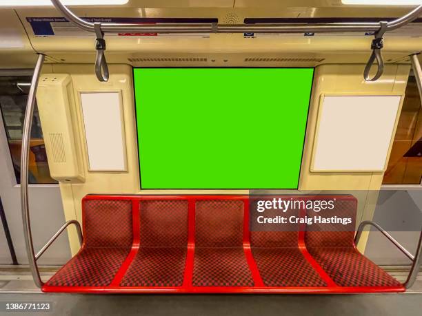 medium size green screen chroma key marketing advertisement billboard in subway underground train environment targeting adverts at consumers, retail shoppers, commuters and tourists. - poster size stock pictures, royalty-free photos & images