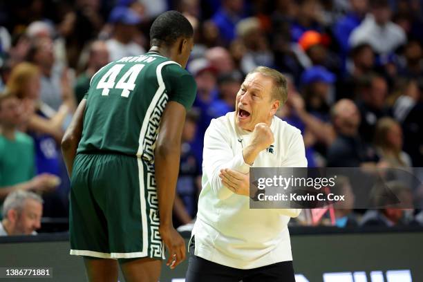 Head coach Tom Izzo of the Michigan State Spartans talks with Gabe Brown of the Michigan State Spartans in the second half against the Duke Blue...