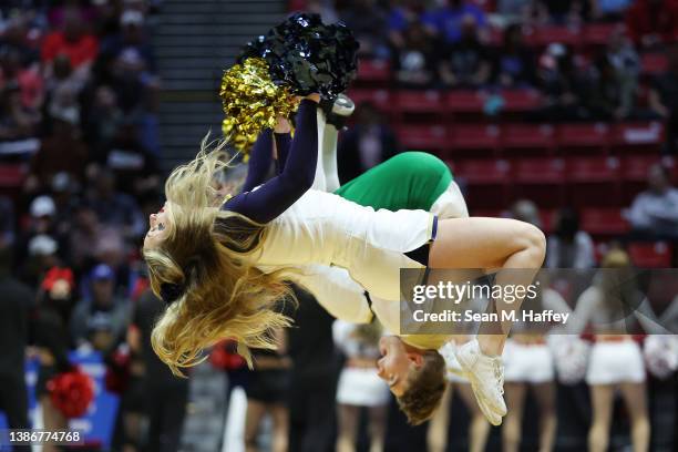 Notre Dame Fighting Irish cheerleaders perform in the second round game of the 2022 NCAA Men's Basketball Tournament between the Notre Dame Fighting...