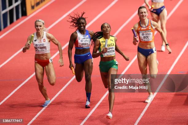 Stephenie Ann McPherson of Jamaica JAM finishes ahead of Femke Bol of Netherlands NED, Justyyna Swiety-Ersetic of Poland POL and Lynna Irby of The...