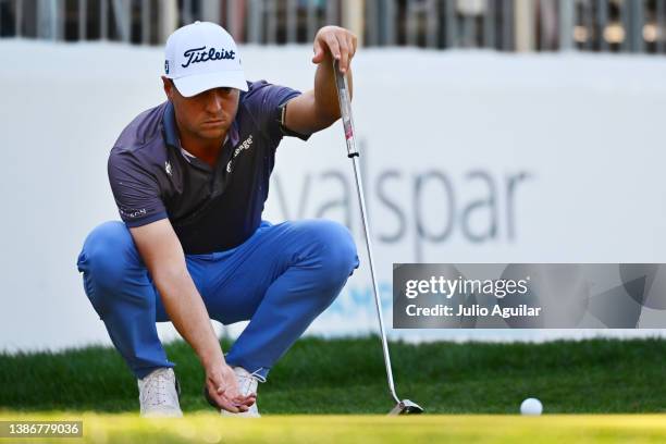 Justin Thomas of the United States lines up a putt on the 16th green during the final round of the Valspar Championship on the Copperhead Course at...