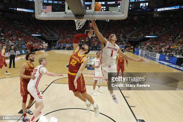 Johnny Davis of the Wisconsin Badgers blocks a shot by Gabe Kalscheur of the Iowa State Cyclones during the second half in the second round of the...
