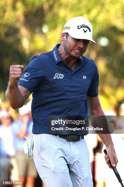 Sam Burns of the United States reacts to his winning putt on the 16th green during a playoff in the final round of the Valspar Championship on the...