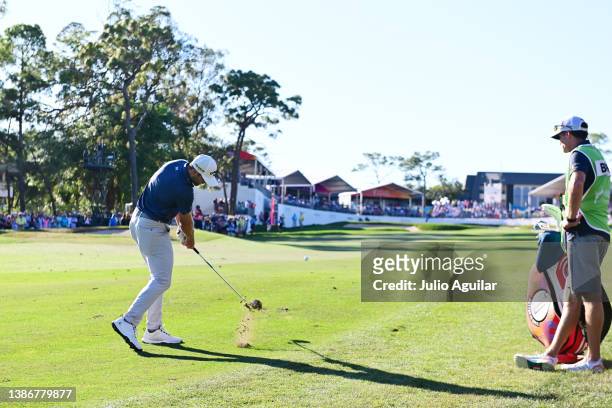 Sam Burns of the United States plays a shot on the 18th hole during the final round of the Valspar Championship on the Copperhead Course at...