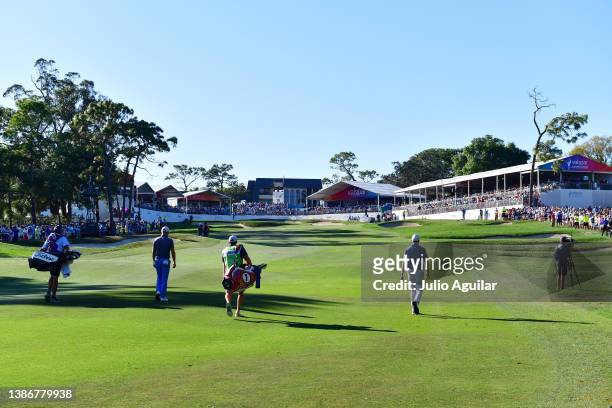 Justin Thomas of the United States and Sam Burns of the United States walk up the 18th fairway during the final round of the Valspar Championship on...