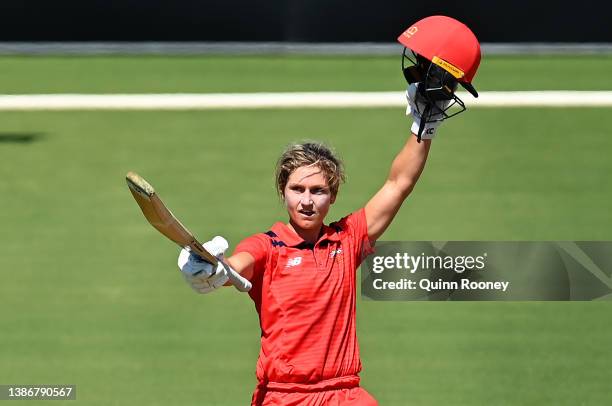 Bridget Patterson of South Australia celebrates reaching her century during the WNCL match between Victoria and South Australia at Junction Oval on...