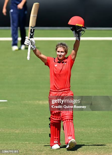 Bridget Patterson of South Australia celebrates reaching her century during the WNCL match between Victoria and South Australia at Junction Oval on...