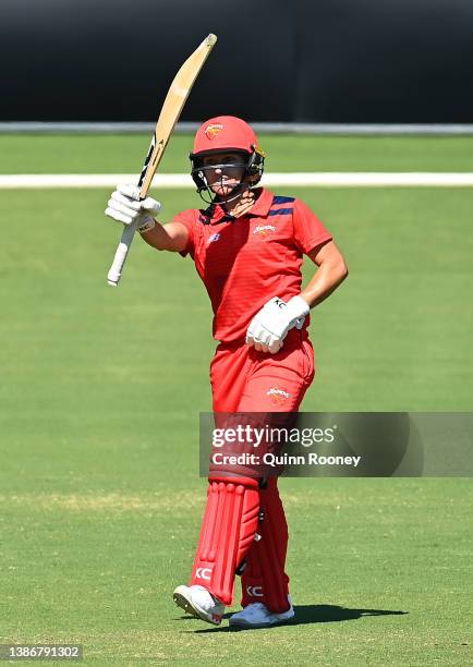 Bridget Patterson of South Australia celebrates reaching her century during the WNCL match between Victoria and South Australia at Junction Oval on...