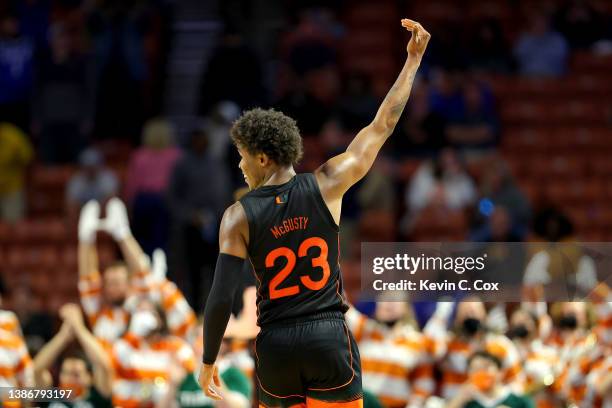 Kameron McGusty of the Miami Hurricanes reacts in the second half against the Auburn Tigers during the second round of the 2022 NCAA Men's Basketball...