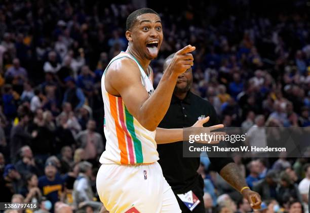 Keldon Johnson of the San Antonio Spurs celebrates after he got an offensive rebound and put back bucket to take the lead against the Golden State...
