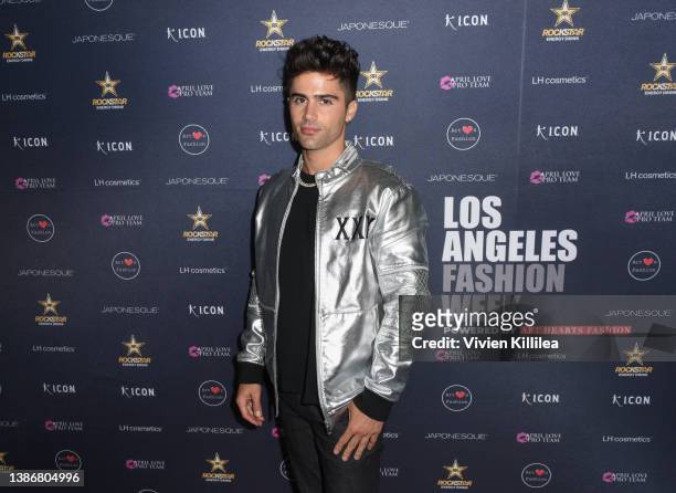 Max Ehrich attends Los Angeles Fashion Week Powered By Art Hearts Fashion Fall/Winter 2022 on March 20, 2022 in Los Angeles, California.