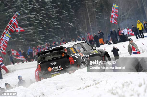 Armindo Araujo of Portugal and Miguel Ramalho of Portugal compete in their WRC Team Mini Portugal Mini John Cooper Works WRC during Day1 of the WRC...