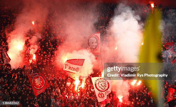 Olympiacos fans light up signal flares ahead of the Superleague match between Olympiacos Piraeus and AEK Athens at Karaiskakis Stadium on February...