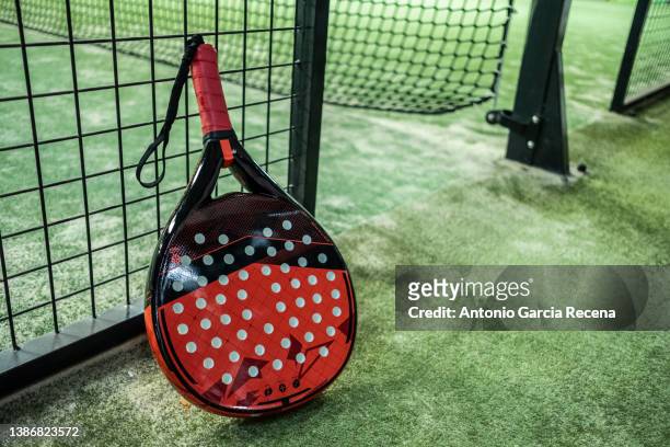 paddle tennis racket in court. padel tournament - raqueta fotografías e imágenes de stock