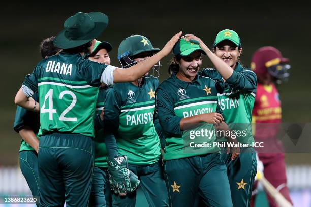 Nashra Sandhu of Pakistan celebrates after taking the wicket of Stafanie Taylor of the West Indies during the 2022 ICC Women's Cricket World Cup...