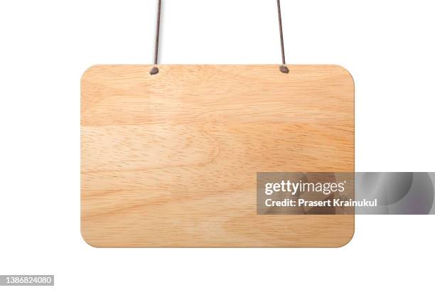 wooden sign hanging isolated on white background. - placard foto e immagini stock