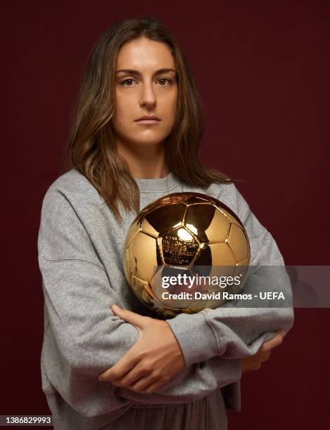Alexia Putellas of FC Barcelona poses for a portrait with the Ballon d'Or trophy during a UEFA Media day on March 09, 2022 in Barcelona, Spain.